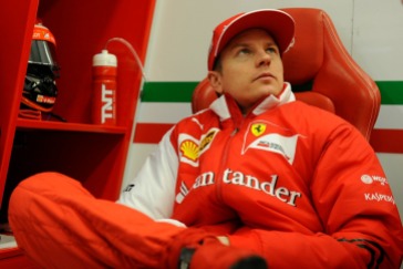 Kimi Raikkonen relaxes in the Ferrari pit garage (Image: Ferrari)